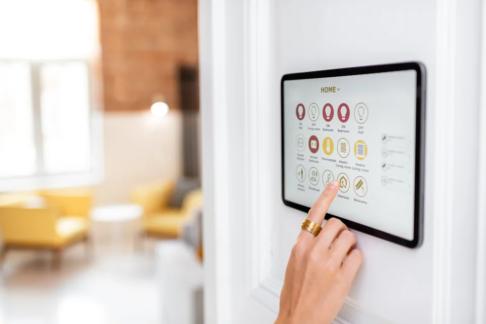 Controlling smart home functions with a wall-mounted touch panel